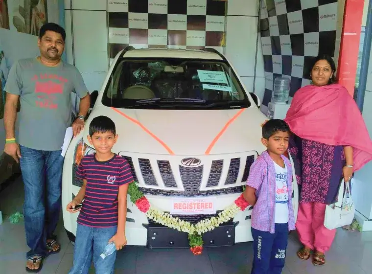 Girish and family with their new SUV